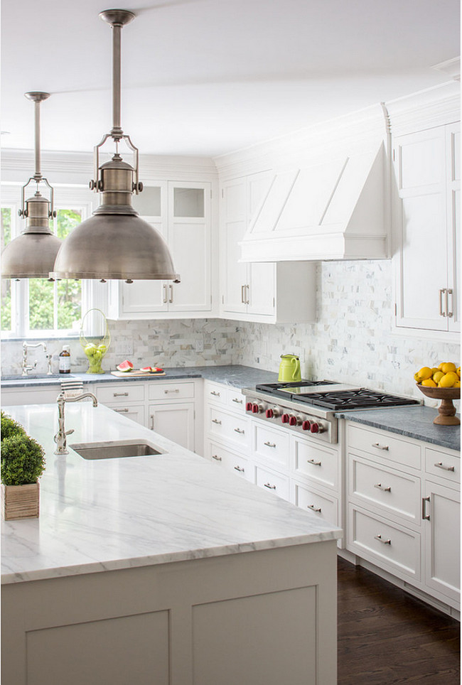 White and gray countertop. Kitchen White and gray countertop. Gray and white is a popular color combination for white kitchens. Island is Calacatta Gold Marble in Honed Finish. Perimeter is Classic Soapstone which was selected for its durability and soft grey color. Connecticut Stone.