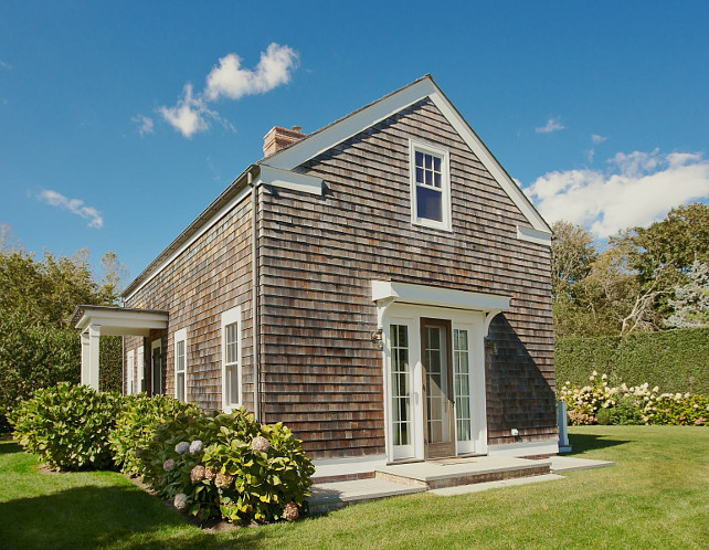 Aged cedar shake siding. Cottage with aged cedar shake siding. #cedarshakesiding #AgedCedarShakes Via Sotheby's Homes.