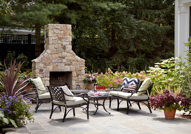 Backyard with natural stone - Bluestone Patio and Outdoor Fireplace. Jules Duffy Designs.