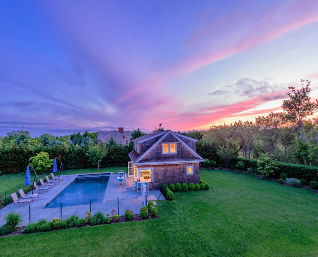 Backyard. Family home backyard with fence in pool. Via Sotheby's Homes.