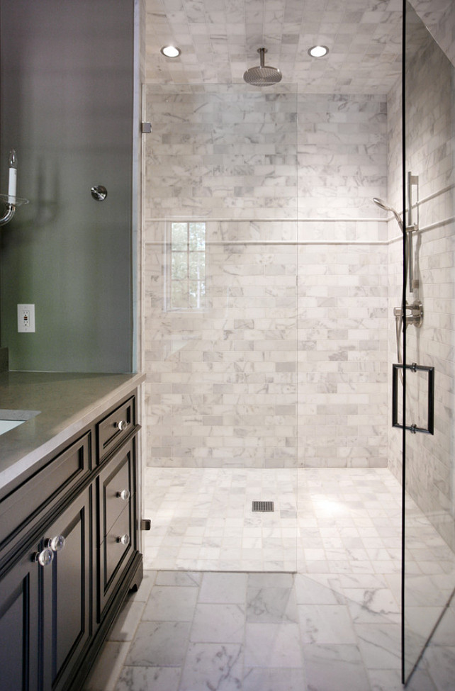 Bathroom Shower Tiling. White Marble 8 x 8 brushed & chiseled floor tiles, White Marble, honed shower tiles by Builders Floor Covering & Tile. #BathroomTiling CR Home Design K&B
