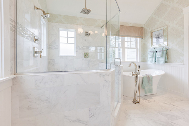 Bathroom Tiling. Bathroom Tiling Ideas. This traditional bathroom features carrara marble tiles for a seamless look. #BathroomTiling #Bathroom #Tiles #CarraraMarbleTiles