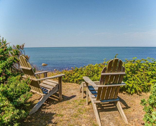 Beach with Adirondack chairs. #Adirondackchair #beach Via Sotheby's Homes.