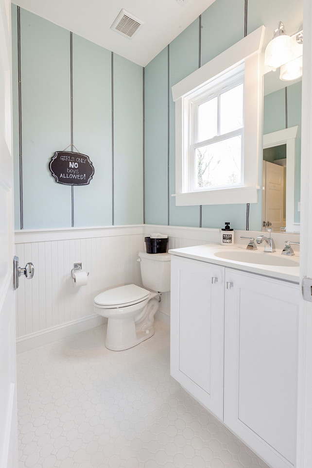 Beadboard Bathroom. Kids Bathroom with Beadboard. White Beadboard. In this bathroom black and white grosgrain ribbon tacked at regular intervals creates a clever striped wall treatment. #Beadboard #Bathroom