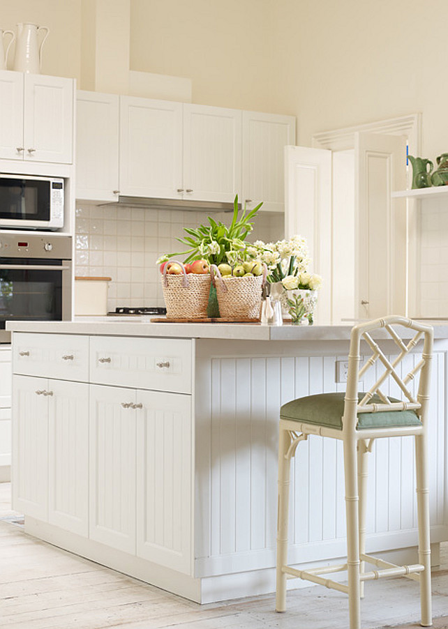 Beadboard Kitchen Island. White Beadboard Kitchen Island Ideas. Beadboard Kitchen Island Design. Beadboard Kitchen Island White beadboard kitchen island with gray top lined with ivory faux bamboo bar stool. Adelaide Bragg.