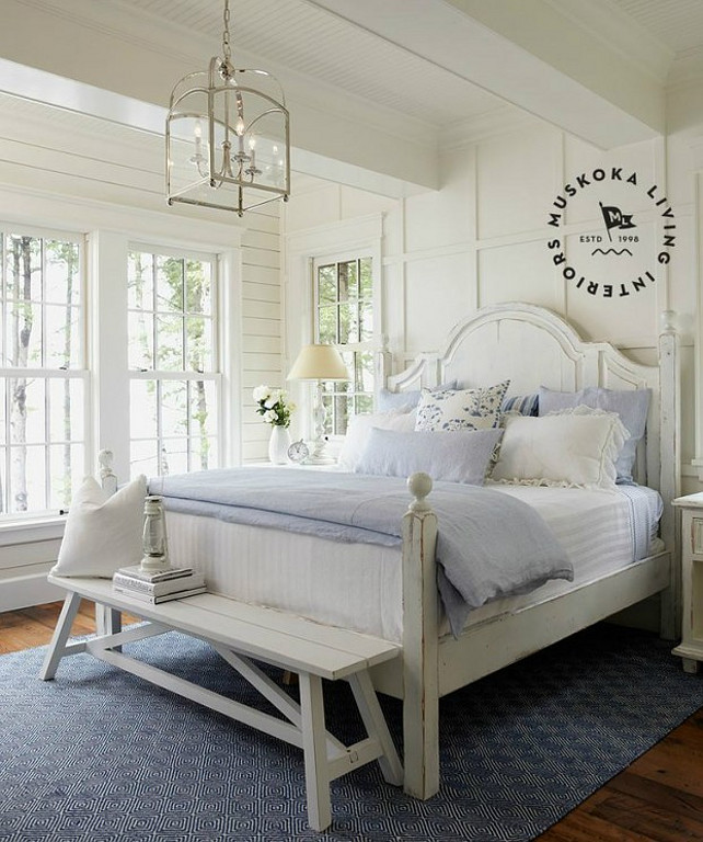 Bedroom. Coastal Master Bedroom Ideas. White Master Bedroom with blue decor. Image by Muskoka Living Interiors. #bedroom #MasterBedroom #Coastal #Interiors #WhiteBedroom #MuskokaLivingInteriors.