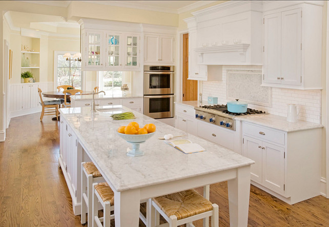 Crisp White Kitchen Design. I am loving the paint color of this Crisp White Kitchen. #CrispWhiteKitchen #KitchenDesign