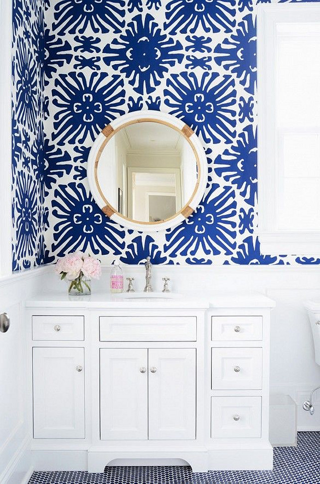 Blue and white Wallpaper. Blue and white wallpaper with round mirror from Serena and Lily in bright white bathroom #BlueanWhite #Wallpaper #Bathroom Via Domaine Home.