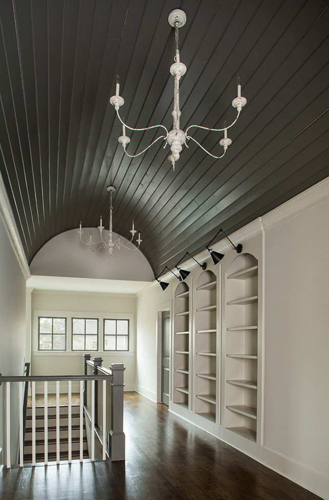 Bookcase hallway ideas. Landing area with built-in bookcase and vaulted barrel ceiling. Vikki Werbalowsky from La Bella Vie.