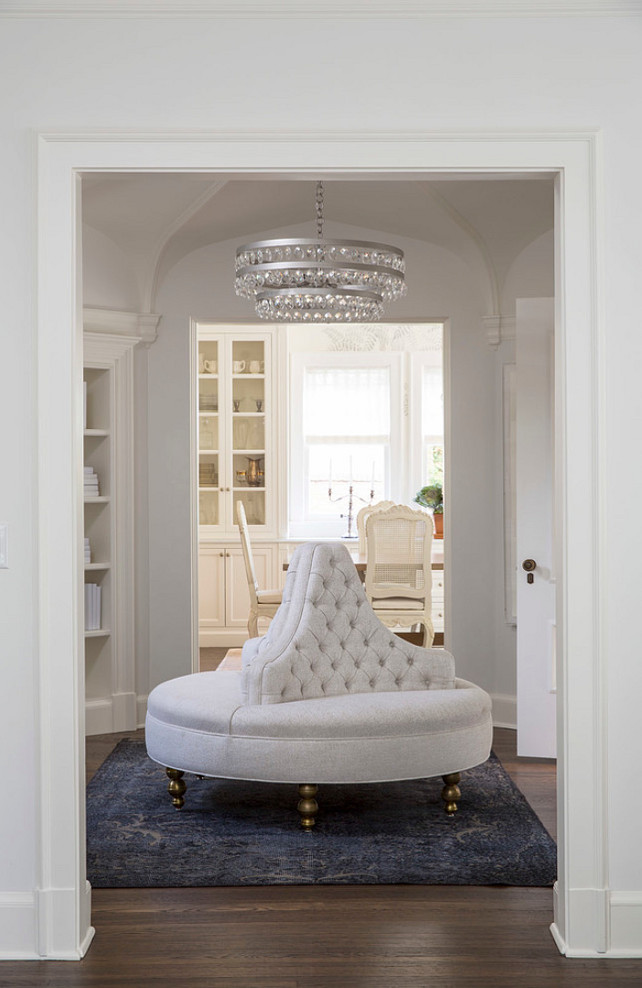 Bradley Chandelier and Bradley Ottoman in room painted in Benjamin Moore White Dove. Martha O'Hara Interiors.