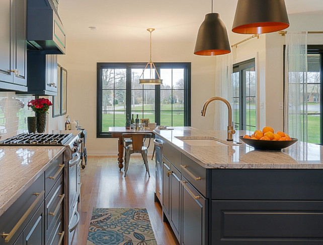 Brass Kitchen Hardware. Modern Kitchen with Brass Hardware and Brass Gooseneck Kitchen Faucet. #Brass #BrassHardware #Kitchen #BrassFaucet Redstart Construction.