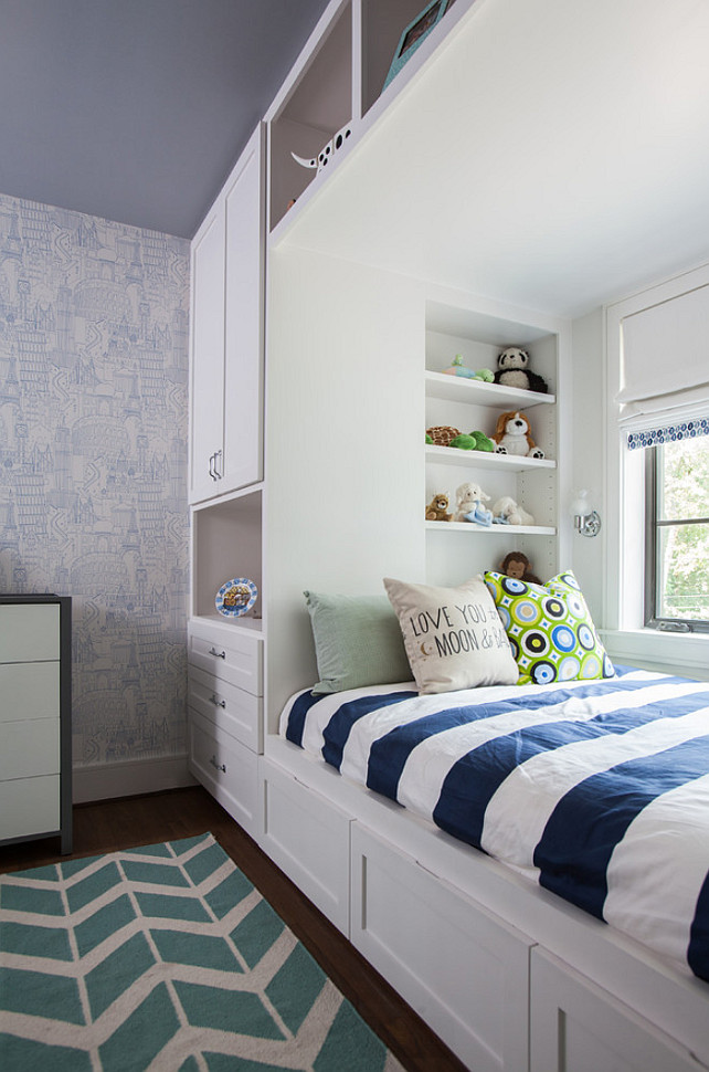 Built-in Bed with wardrobe. Kids bedroom with custom built-in bed and wardrobe. The wallpaper is Globetrotter Blue. #KidsBedroom #BoysBedroom #BuiltinBed #BuiltinWardrobe Laura U, Inc.