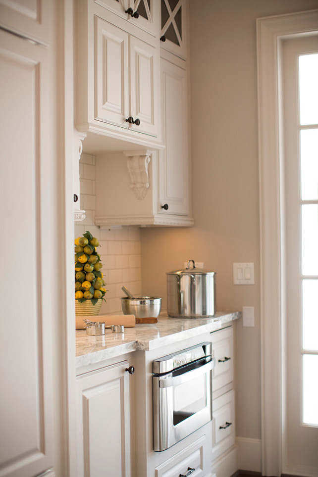Butlers Pantry with built-in microwave oven. #ButlerPantry Whitestone Builders.