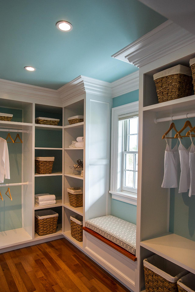 Closet. Walk-in Closet Ideas. A cozy window seat separates custom-built closet units and offers a comfortable place to rest while getting ready.. #Closet