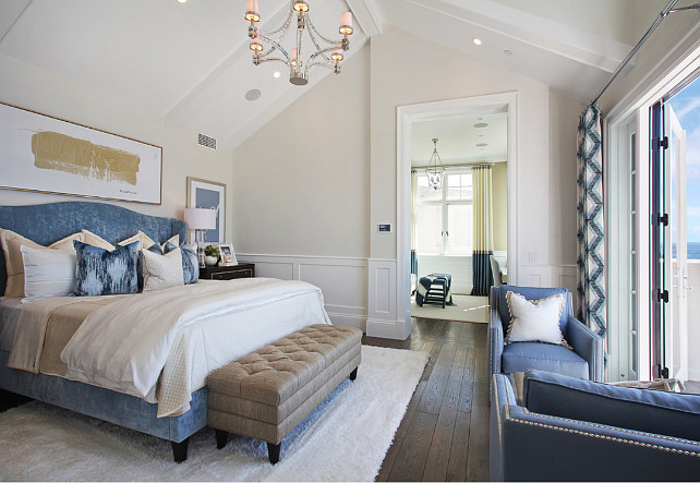 Coastal master bedroom with blue and white, cream, ivory white decor. #CoastalBedroom #MasterBedroom #Blueandwhite #CreamyBedroom #IvoryBedroom #CoastalInteriors Spinnaker Development.