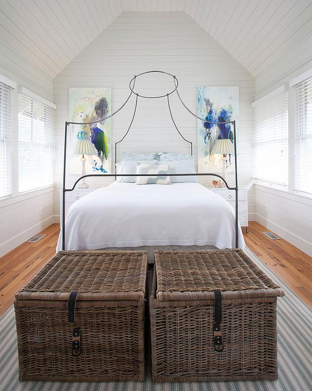 Cottage Bedroom. Cottage bedroom features shiplap walls and ceiling over an Italian Campaign Canopy Bed. #CottageBedroom #Bedroom #Cottage #Coastal Lucy and Company