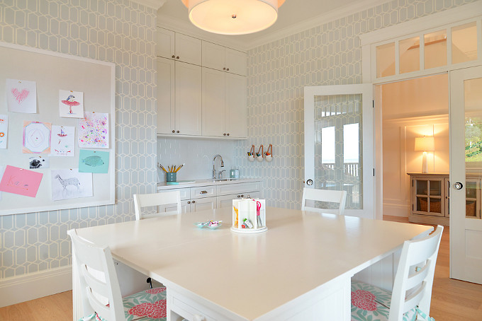 Craft Room. The wall covering is called Modern Trellis by Schumacher. Desk and desk chairs are from Pottery Barn. Cushion fabric is from Caitlin Wilson Textiles. Sunshine Coast Home Design.