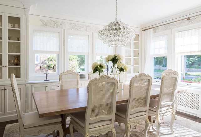 Creamy white dining room painted in Benjamin Moore White Dove OC-17. Martha O'Hara Interiors.