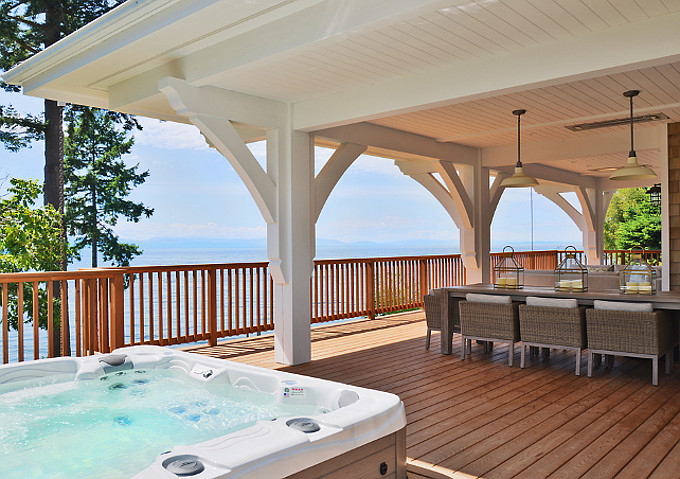 Deck with ocean view and hot tub. Sunshine Coast Home Design.