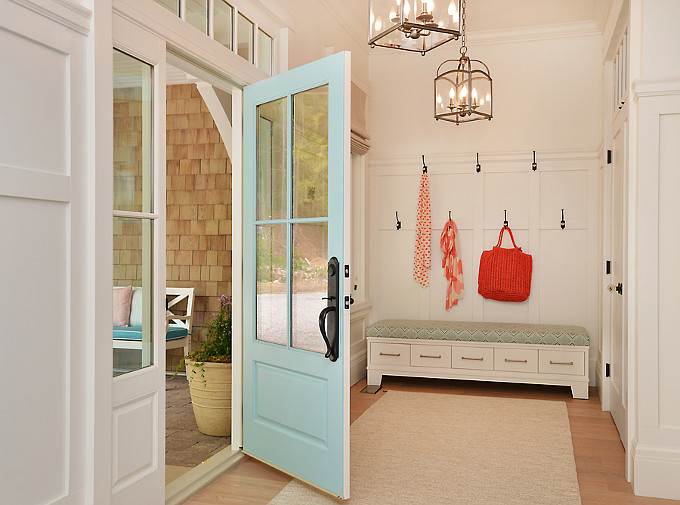 Top Foyer Pin: "Coastal Foyer". Turquoise front door paint color is by "Farrow and Ball, Number 210, Blue Ground". Foyer Lighting. Foyer with lantern pendant lights. The lights are Millbrook pendant lights in historic nickel from Hudson Valley Lighting, product number 8412-HN. The bench was built as a custom piece of furniture for the foyer. #Foyer #Lighting #lanternPendants Design by Walter Powell Architect, Sunshine Coast Home Design.