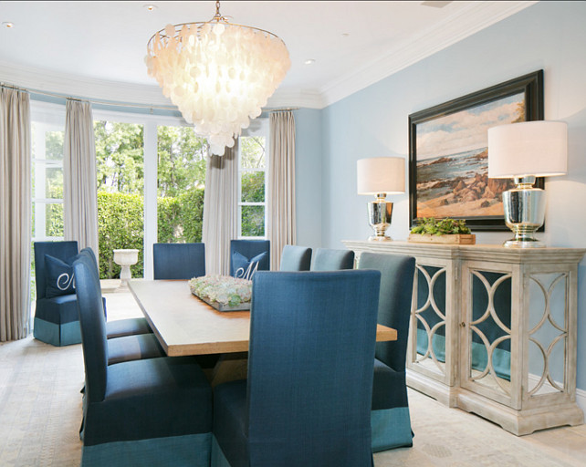 Dining Room Ideas. Dining Room Decor. The dining room has a coastal, casual feel that I love. Notice the beach-y capiz chandelier and two-tone upholstered dining chairs. #DiningRoom #DiningRoomDecor #DiningRoomIdeas Brooke Wagner Design.