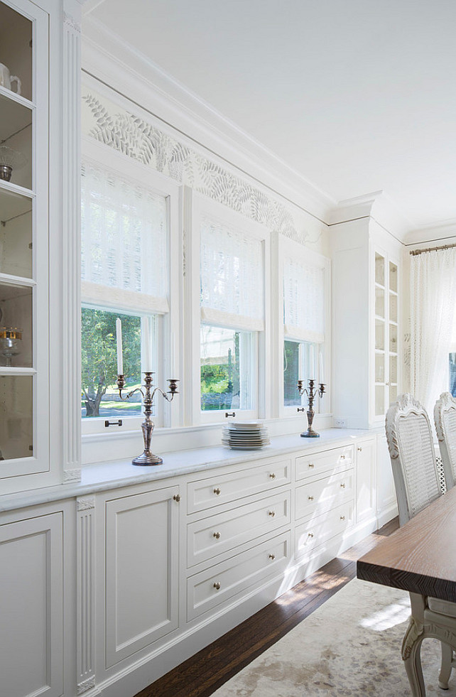 Dining Room built-in cabinet painted in BM White Dove and Lincoln Gold Vein Marble countertop. #LincolnGoldVein #Marble Martha O'Hara Interiors.