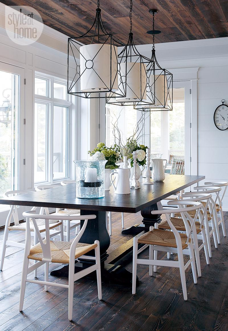 Dining Room. Cottage Dining Room. Rustic Cottage Dining Room with iron pendant lights, Wishbone-style chairs and traditional trestle table. #DiningRoom Style at Home.