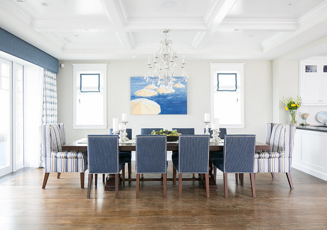 Dining Room. Dining room with blue and yellow decor, blue chairs, chandelier, dining table, recessed lighting, white and blue curtains, wood floor. #DiningRoom