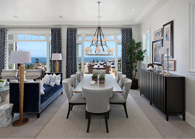 Dining Room. Ocean view dining room with a large chandelier. Dining room with Westbury Double Tier Chandelier. #WestburyDoubleTierChandelier #DiningRoom Spinnaker Development.