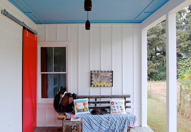 Farmhouse exterior painted in Benjamin Moore Simply White OC-117 The Color of the Year. Corynne Pless Photography via Houzz.