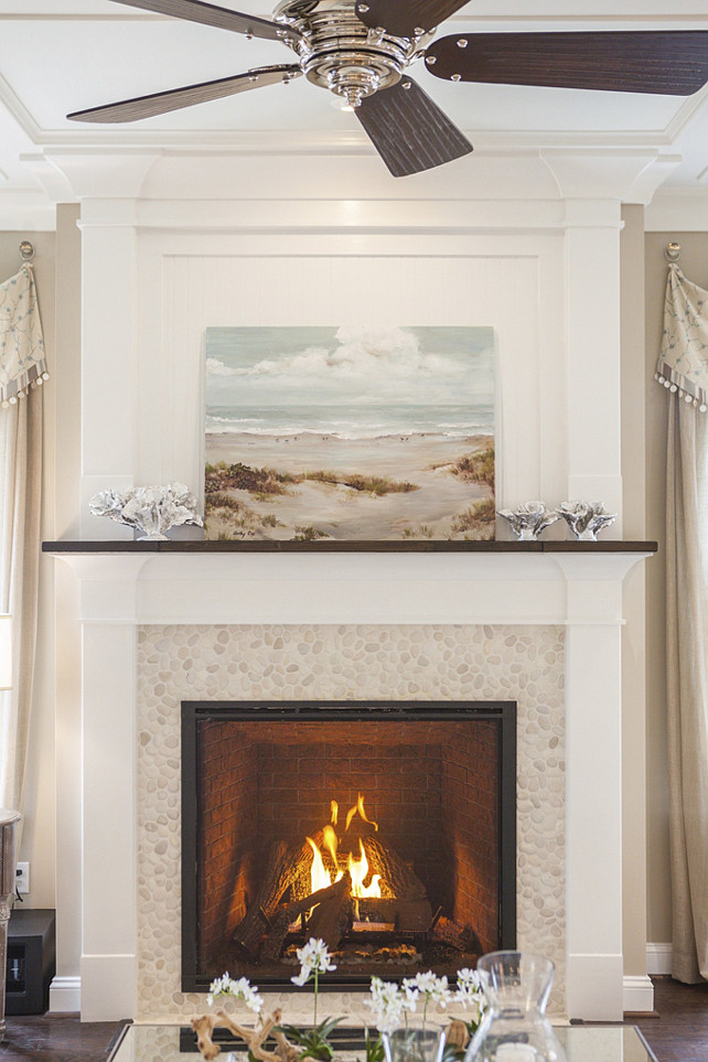 Fireplace. Coastal Fireplace Ideas. Nautical Fireplace. Beach House Fireplace. Coastal Fireplace Decorating Ideas. How to decorate a coastal inspired fireplace. Fireplace mantel and trim paint color is Sherwin Williams SW7005 Pure White. Wall paint color is SW7547 Sandbar. #Fireplace #LivingRoom #Coastal #nautical