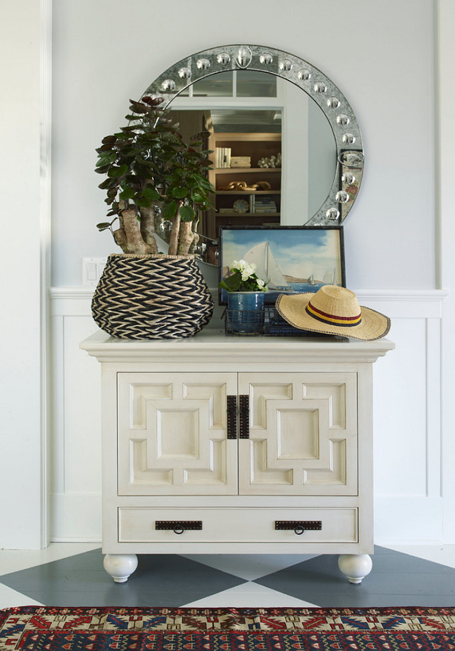 Foyer Decor Ideas. Foyer design. Foyer furniture. Foyer with dresser and round mirror. The walls are painted "Dovefeather by Pratt & Lambert". #Foyer Burnham Design