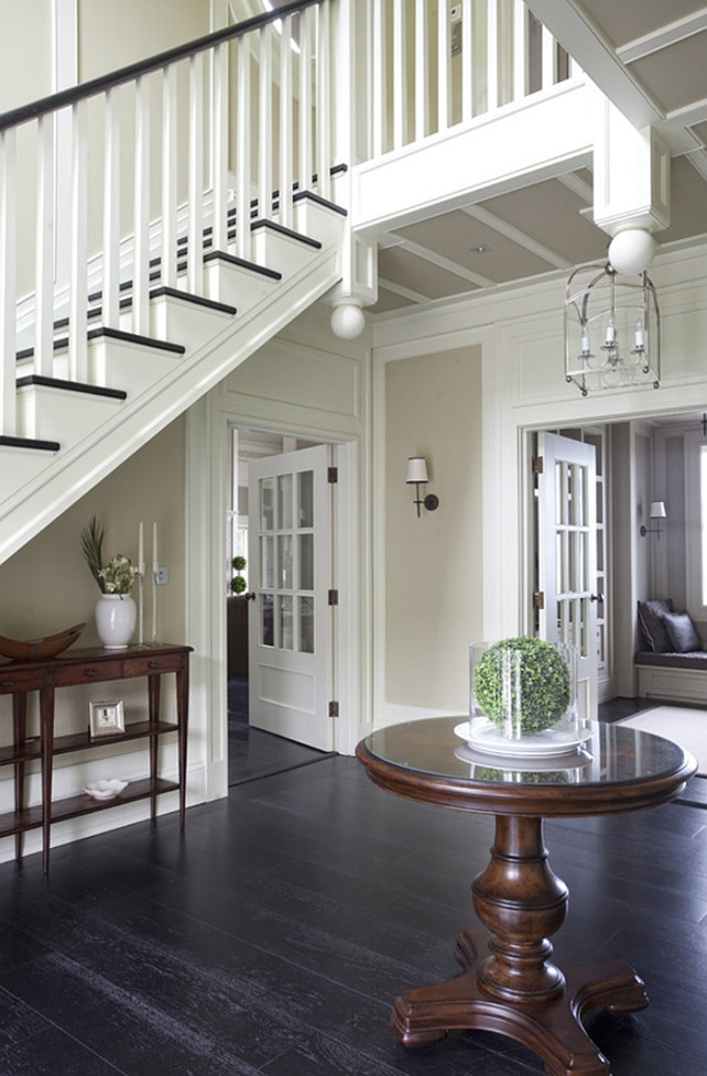 Foyer Flooring. Plank Hardwood Foyer Flooring. The floor in this foyer is a black-stained, wide-plank, oak, engineered board by Trunk Flooring. #Foyer #Flooring #WidePlank Wall Morris Design.