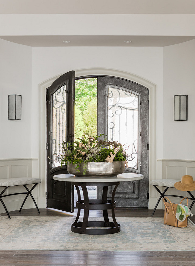 Foyer. Foyer Decorating Ideas. Beautiful Foyer with gray paint color and custom steel front door. #Foyer #FoyerDesign #FoyerDecor Anita Clark Design.