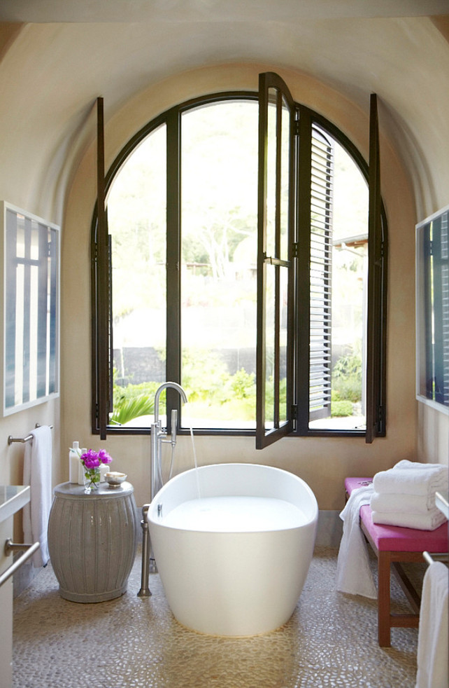 Freestading bath under window. Interior Design by Beth Webb Interiors.