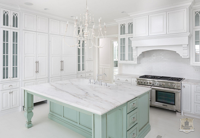 French Kitchen with white perimeter cabinets and mint green kitchen island. #FrenchKitchen #French #KItchen #French #WhiteKitchen #MintGreen #Island Stonecroft Homes.