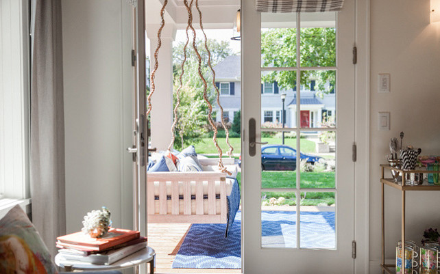 Front Porch with French doors and swing. Photos by Caitlin Abrams.