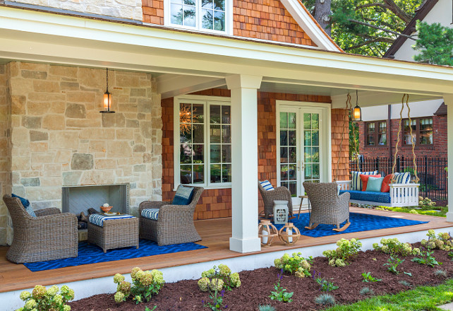 Front Porch. New front porch idea. Front porch with outdoor fireplace, outdoor furniture and swing. #FrontPorch #Porch #OutdoorFireplace #Swing #OutdoorFurniture Great Neighborhood Homes.