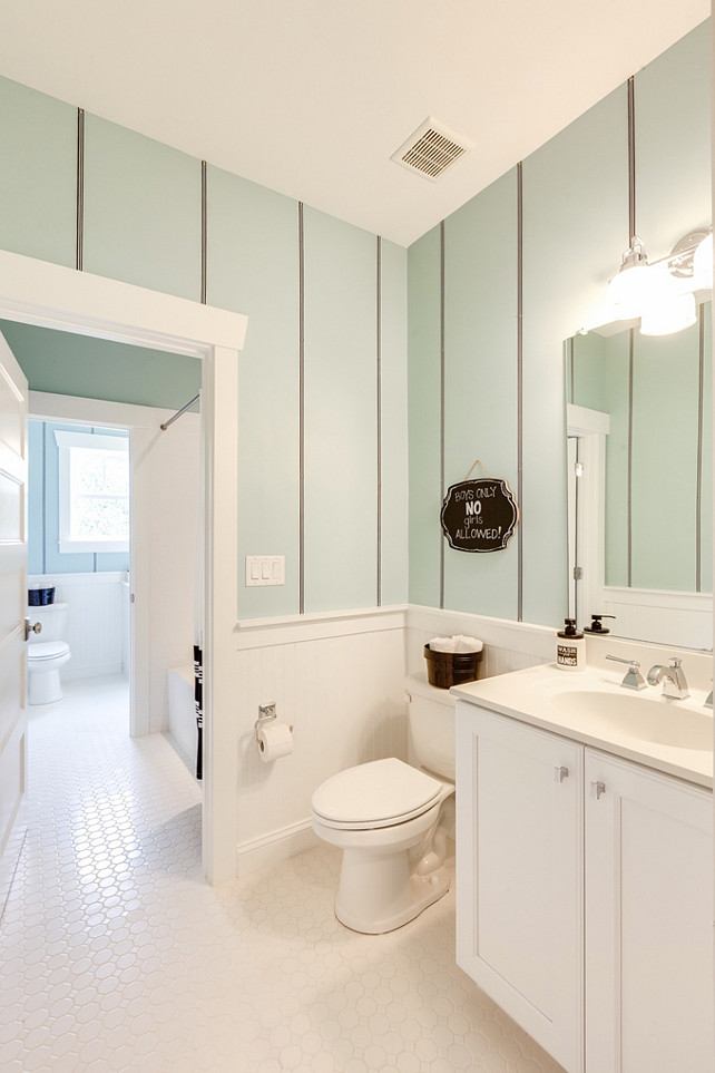 Girls Bathroom Ideas. Cute seafoam girls bathroom with striped walls and classic white octagon tiles. #GirlsBathroom #Bathroom