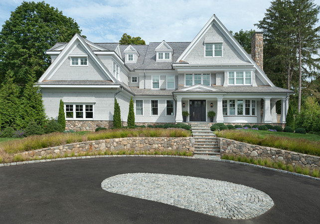 Home Exterior Ideas. Shingle Home Exterior Ideas. Classic Nantucket Shingle Style with the clean lines and modern finishes. #HomeExterior #ShingleHome Blue Water Home Builders.