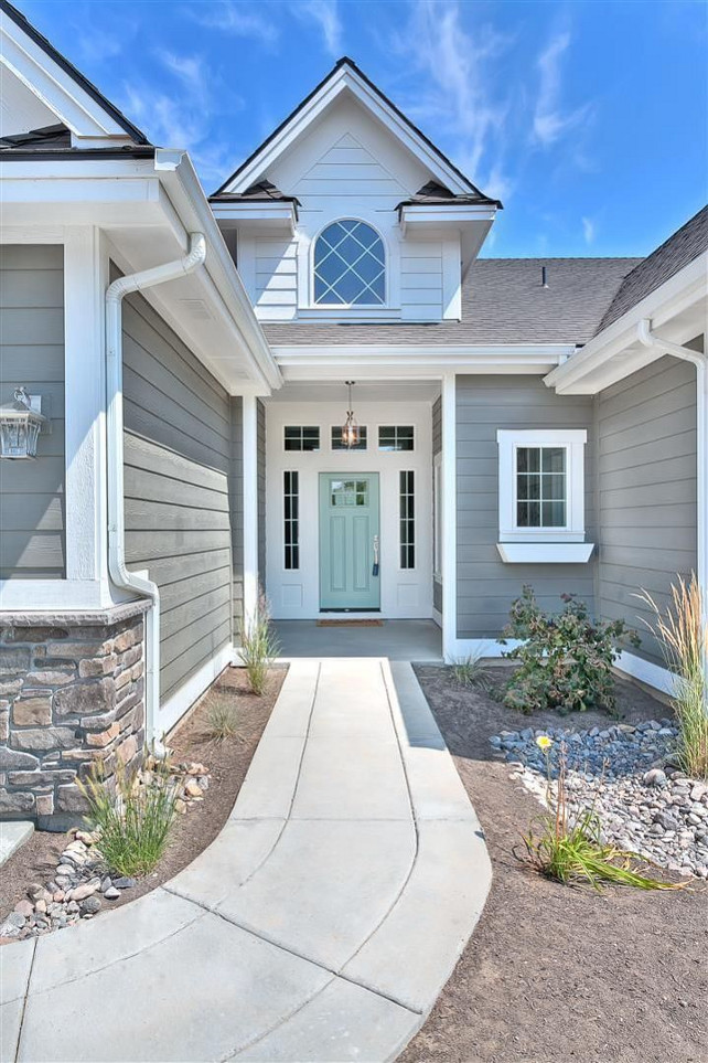 Home exterior Paint Color. Coastal Home Exterior Paint Color. Beach House Exterior Paint Color. Siding painted in Amherst Gray HC-167 Benjamin Moore. Front door paint color is painted in HC-143 Wythe Blue Benjamin Moore. #BenjaminMoore #HC143 #WytheBlue #BenjaminMooreAmherstGray #HC167 #HomeExteriroPaintColor #BenjaminMoorePaintColors