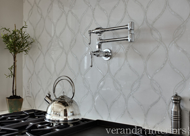 Kitchen Backsplash. The kitchen backsplash is a combination of mother of pearl and white thassos marble by Artistic Tile. #Kitchen #Backsplash #WhiteMarble #TassosMarble Veranda Estate Homes & Interiors