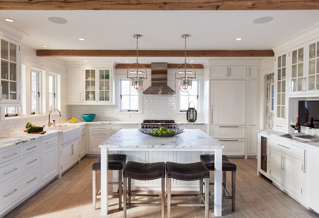 Kitchen Beams. White Kitchen with Beams. White Kitchen Beamed Ceiling. Kitchen with Beams and white subway tile backsplash. The tiles are from Mexican Handcrafter. #Kitchen #Beams #CeilingBeams #SubwayTileKitchen #MexicanHandcrafterTiles