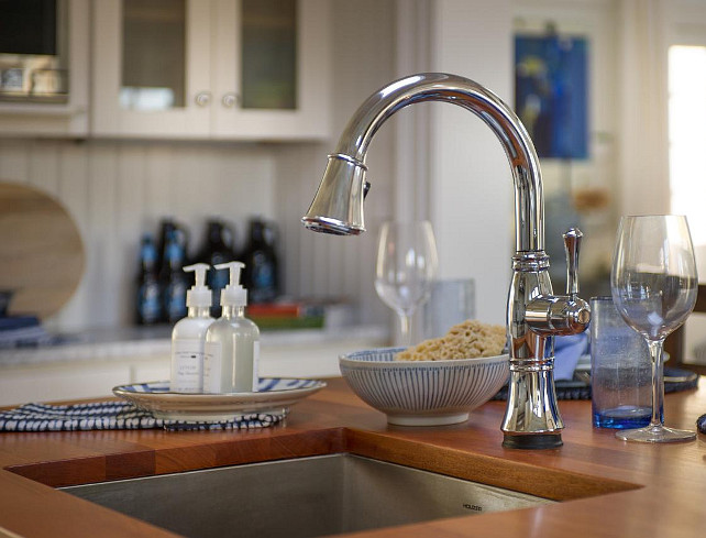 Kitchen Faucet Ideas. Sink Faucet. A classic chrome faucet features a single pull-down handle as well as modern touch technology that makes it easy to run the faucet even when hands are full. #Kitchen #Faucet #SinkFaucet #KitchenFaucet