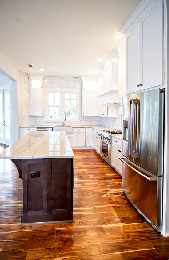 Kitchen Hardwood Flooring. Kitchen wide plank hardwood Floors. #KitchenFlooring #KitcheHardwoodFlooring #WideplankFloors Glenn Layton Homes