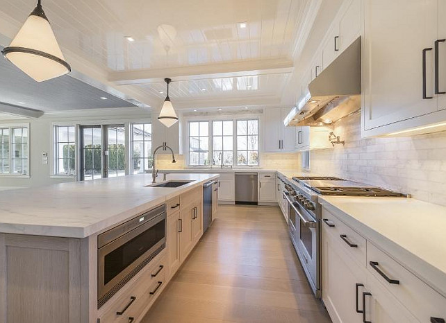 Kitchen Island Lighting. Kitchen island lights. Kitchen island pendant light. Kitchen island pendants. #KitchenIslandLighting Michael Davis Design and Construction.