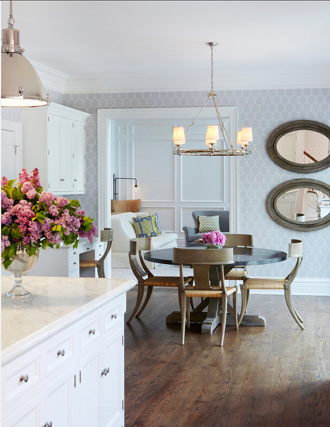 Kitchen Lighting Ideas. Pendant Ligthing above island are by Ralph Lauren. Chandelier lighting above table is from William-Sonoma Home. Wallpaper is the "Schumacher Tracery Wisteria Wallpaper". #Kitchen #Lighting