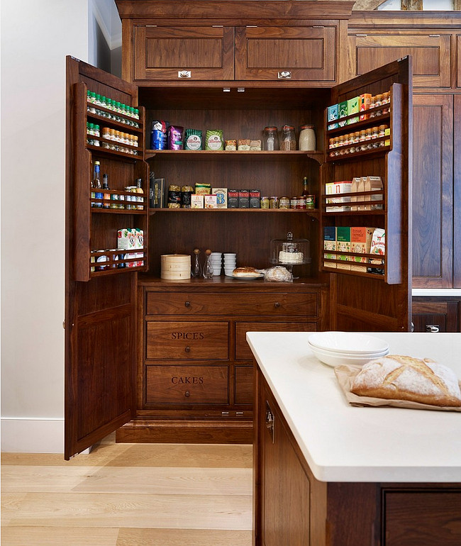 Kitchen Spice Cabinet. Kitchen cabinets are made from American walnut and offer spice racks inside. #Kitchen #Spice #Cabinet #AmericanWalnut . Humphrey Munson.