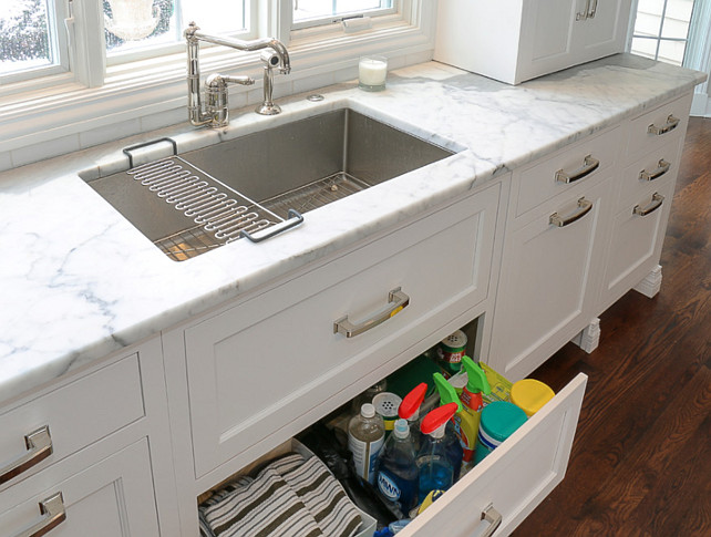 Kitchen Under Sink Storage. Add Drawers under the kitchen sink for a more practical storage space. This is much easier on your back. #KitchenStorage #Kitchen #Storage #UnderSinkStorage Redstart Construction.