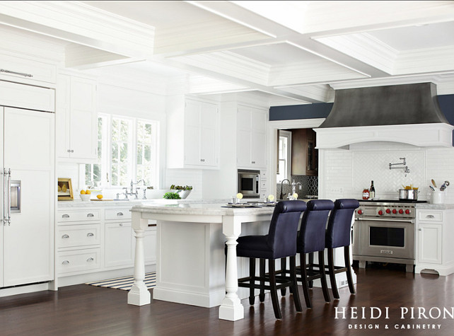 Kitchen. White Kitchen. White kitchen with large island and custom hood. #Kitchen #WhiteKitchen Heidi Piron Design & Cabinetry.